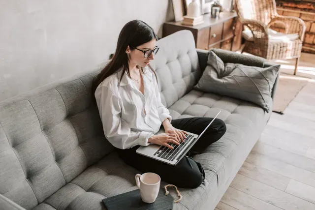A woman booking an appointment on her laptop